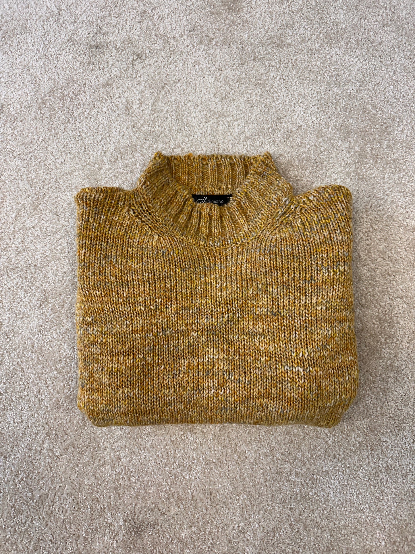 Short knitted melange sweater "Tyla"