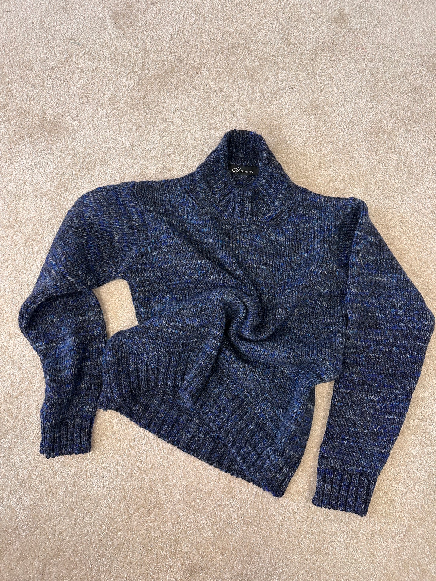 Short knitted melange sweater "Tyla"
